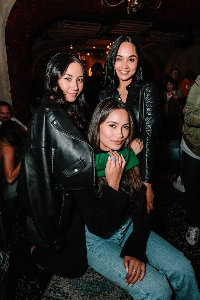 a group of women posing for a picture