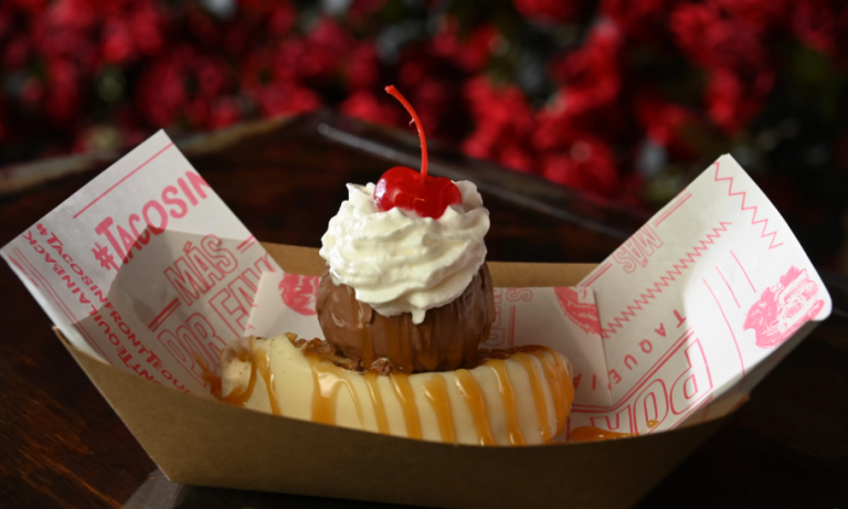 Once You Go Choco dessert at Más Por Favor – a Choco taco in Las Vegas made with a waffle taco shell, dulce de leche ice cream, dark chocolate shell, and whipped cream.