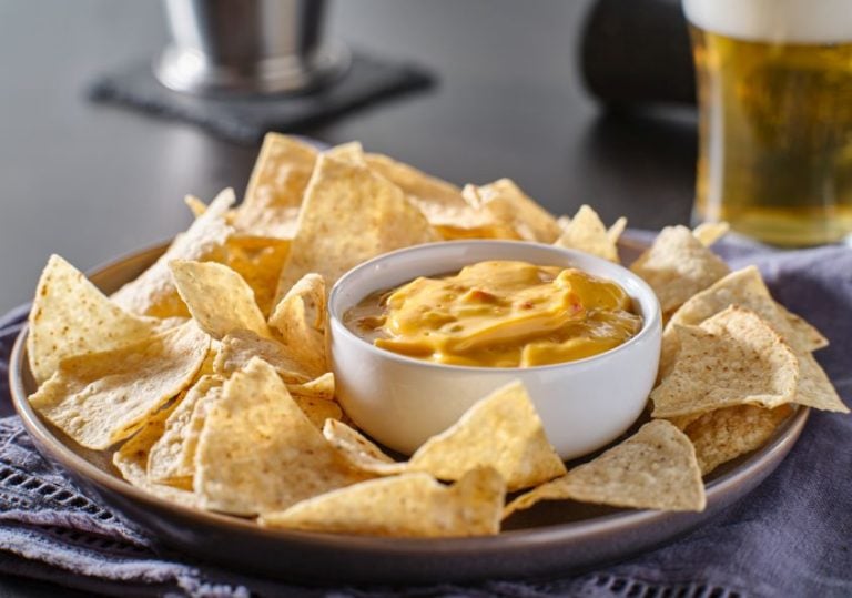 Creamy MAS Queso cheese dip served with tortilla chips at Más Por Favor, a top Las Vegas spot for those searching for the best queso dip around